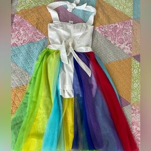 Disney “Inside Out” 2 piece white halter romper with wrap around rainbow skirt.